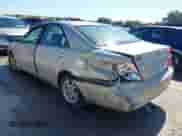 2004 Toyota Camry LE with VIN 4T1BF32K54U070031, listed as a IAAI auction lot 43422695 with 230,696 mi miles and . Bid and sale history available at DreamBid. Image 3.