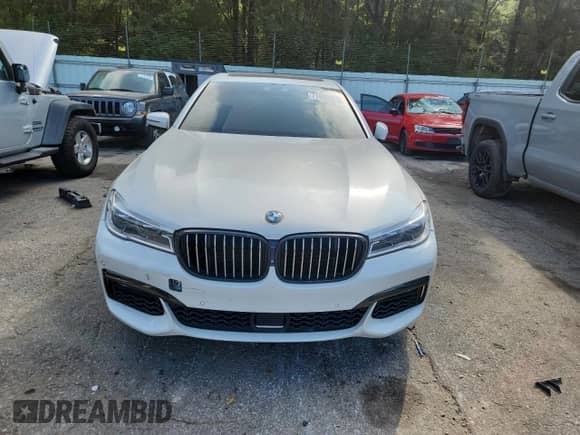 2019 BMW 7 Series 750i xDrive with VIN WBA7F2C5XKB239365, listed as a Copart auction lot 71458315 with 73,685 mi miles and Salvage title. Bid and sale history available at DreamBid. Image 5.