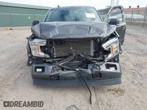 2020 Ford F-150 XL z VIN 1FTEW1EP4LKE27660, wystawiony jako IAAI lot #43303281 z przebiegiem 35 721 mil mil oraz . Historia ofert i sprzedaży dostępna na DreamBid. Obrazek 6.