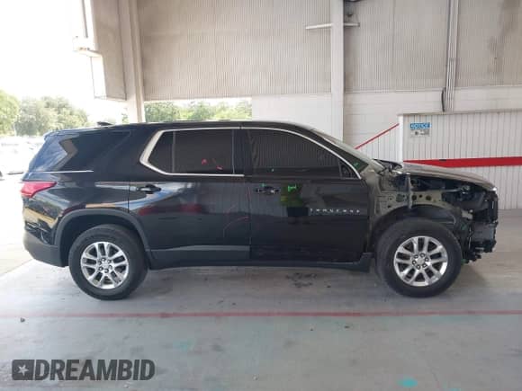 2019 Chevrolet Traverse LS z VIN 1GNERFKW3KJ118080, wystawiony jako IAAI lot #43123817 z przebiegiem 113 326 mil mil oraz . Historia ofert i sprzedaży dostępna na DreamBid. Obrazek 14.