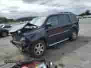 2010 Honda Pilot Touring with VIN 5FNYF4H8XAB019225, listed as a Copart auction lot 69248625 with 219,354 mi miles and Salvage title. Bid and sale history available at DreamBid. Image 1.