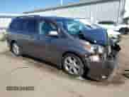 2012 Toyota Sienna SE with VIN 5TDXK3DC7CS266793, listed as a Copart auction lot 64224885 with 240,033 mi miles and Salvage title. Bid and sale history available at DreamBid. Image 4.