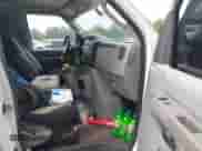 2014 Ford Econoline Cargo Commercial with VIN 1FTNS2EW4EDA01130, listed as a IAAI auction lot 43405796 with 122,008 mi miles and . Bid and sale history available at DreamBid. Image 8.