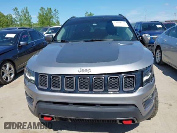 2018 Jeep Compass Trailhawk z VIN 3C4NJDDB9JT272864, wystawiony jako IAAI lot #42284940 z przebiegiem Nie podano mil oraz . Historia ofert i sprzedaży dostępna na DreamBid. Obrazek 11.