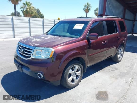 2014 Honda Pilot EX-L with VIN 5FNYF3H5XEB009008, listed as a IAAI auction lot 43024881 with 119,646 mi miles and . Bid and sale history available at DreamBid. Image 2.