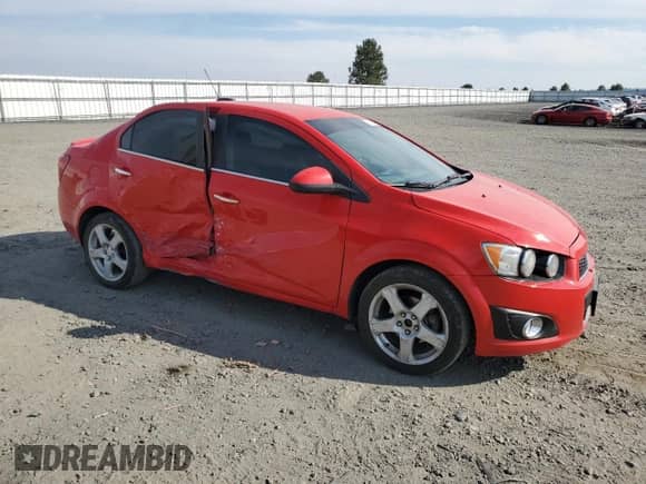 2016 Chevrolet Sonic LTZ with VIN 1G1JE5SB2G4144632, listed as a Copart auction lot 70182705 with 157,986 mi miles and Salvage title. Bid and sale history available at DreamBid. Image 4.