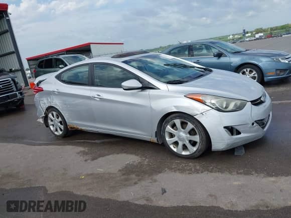 2012 Hyundai Elantra Limited z VIN KMHDH4AE2CU414157, wystawiony jako IAAI lot #42564679 z przebiegiem 113 262 mil mil oraz . Historia ofert i sprzedaży dostępna na DreamBid. Obrazek 13.