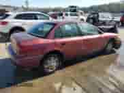 2001 Saturn SL with VIN 1G8ZH54841Z290618, listed as a Copart auction lot 77850194 with 128,083 mi miles and Salvage title. Bid and sale history available at DreamBid. Image 3.