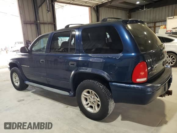 2001 Dodge Durango with VIN 1B4HS28N71F521236, listed as a Copart auction lot 56939715 with 199,223 mi miles and Clean title. Bid and sale history available at DreamBid. Image 2.