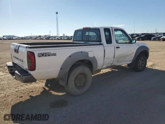 2002 Nissan Frontier XE z VIN 1N6ED26T52C366879, wystawiony jako Copart lot #67726024 z przebiegiem 141 068 mil mil oraz Szkoda całkowita • Salvage title. Historia ofert i sprzedaży dostępna na DreamBid. Obrazek 3.