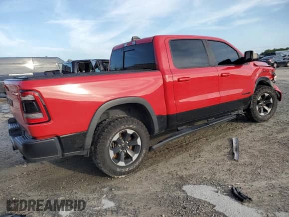 2019 Ram 1500 Rebel z VIN 1C6RRELT0KN614821, wystawiony jako Copart lot #64195475 z przebiegiem 97 406 mil mil oraz Nie do naprawy • Non repairable. Historia ofert i sprzedaży dostępna na DreamBid. Obrazek 3.