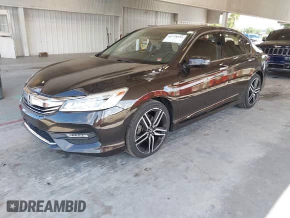 2017 Honda Accord Touring with VIN 1HGCR3F98HA038349, listed as a IAAI auction lot 42778954 with 85,765 mi miles and . Bid and sale history available at DreamBid. Image 2.