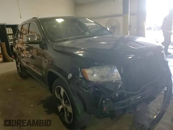 2012 Jeep Grand Cherokee Overland with VIN 1C4RJFCT4CC160396, listed as a Copart auction lot 71516165 with 135,574 mi miles and Salvage title. Bid and sale history available at DreamBid. Image 15.