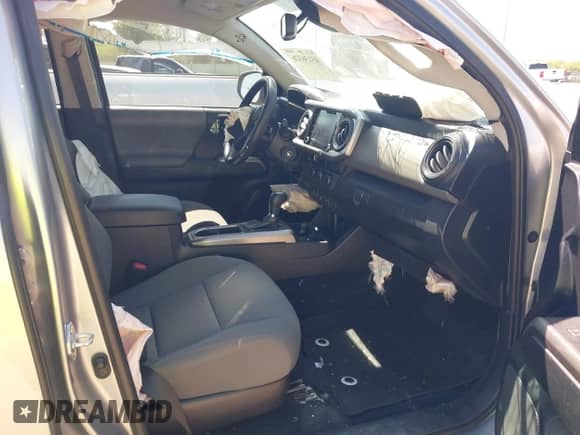 2021 Toyota Tacoma SR5 with VIN 5TFAZ5CN4MX102901, listed as a IAAI auction lot 43136326 with 78,206 mi miles and . Bid and sale history available at DreamBid. Image 5.