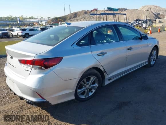 2018 Hyundai Sonata SEL with VIN 5NPE34AF0JH713640, listed as a IAAI auction lot 43368715 with 82,920 mi miles and . Bid and sale history available at DreamBid. Image 4.