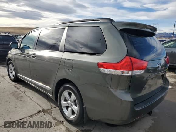 2012 Toyota Sienna LE AAS with VIN 5TDKK3DC3CS185395, listed as a Copart auction lot 86532494 with 119,733 mi miles and Salvage title. Bid and sale history available at DreamBid. Image 2.