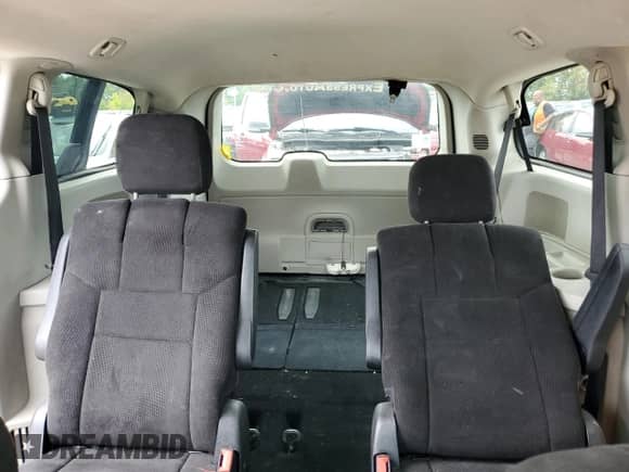 2012 Dodge Grand Caravan American Value z VIN 2C4RDGBG7CR148235, wystawiony jako Copart lot #81545825 z przebiegiem 167 455 mil mil oraz Czysty tytuł • Clean title. Historia ofert i sprzedaży dostępna na DreamBid. Obrazek 10.