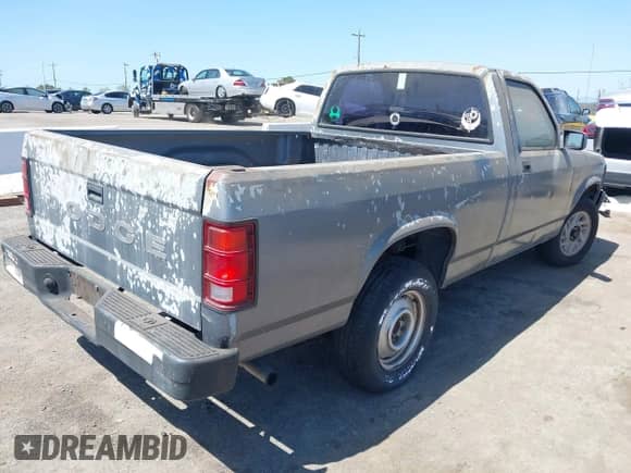 1992 Dodge Dakota S с VIN 1B7FL26X5NS691362, выставлен на аукционе IAAI как лот 42001454 с пробегом 161 181 миль миль и . История ставок и продаж доступна на DreamBid. Изображение 4.