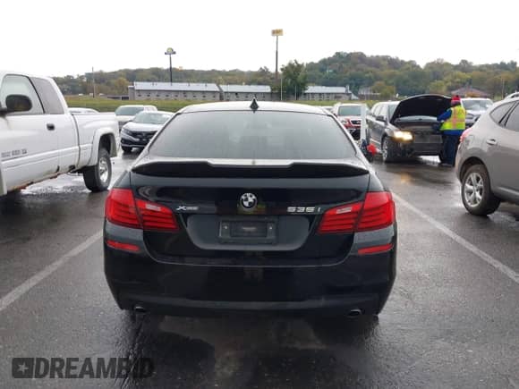 2014 BMW 5 Series 535i xDrive with VIN WBA5B3C55ED293061, listed as a IAAI auction lot 43534562 with 152,325 mi miles and . Bid and sale history available at DreamBid. Image 16.