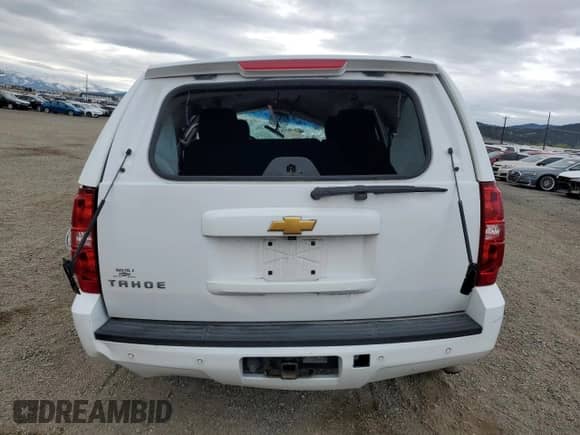 2013 Chevrolet Tahoe LS with VIN 1GNSKAE0XDR139109, listed as a Copart auction lot 53398915 with 141,747 mi miles and Salvage title. Bid and sale history available at DreamBid. Image 6.