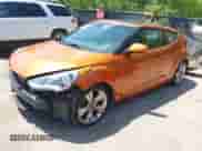 2013 Hyundai Veloster w/Black Int z VIN KMHTC6AD8DU175373, wystawiony jako IAAI lot #42567057 z przebiegiem 141 693 mil mil oraz . Historia ofert i sprzedaży dostępna na DreamBid. Obrazek 19.