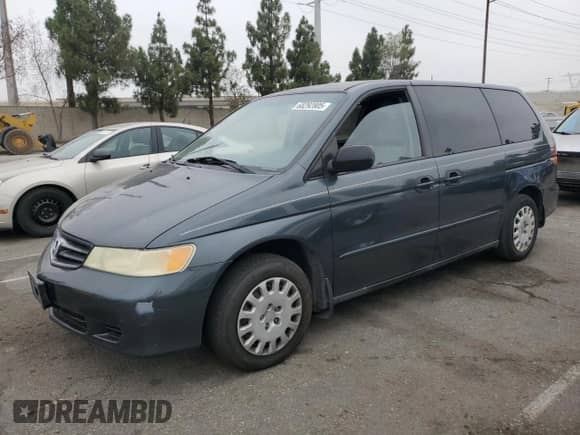 2004 Honda Odyssey LX with VIN 5FNRL18574B137609, listed as a Copart auction lot 68292805 with 172,873 mi miles and Salvage title. Bid and sale history available at DreamBid. Image 1.