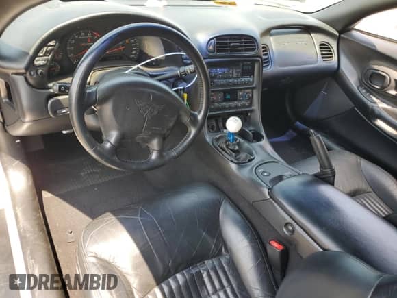 2003 Chevrolet Corvette Z06 z VIN 1G1YY12S935105216, wystawiony jako Copart lot #68721585 z przebiegiem 99 972 mil mil oraz Szkoda całkowita • Salvage title. Historia ofert i sprzedaży dostępna na DreamBid. Obrazek 8.
