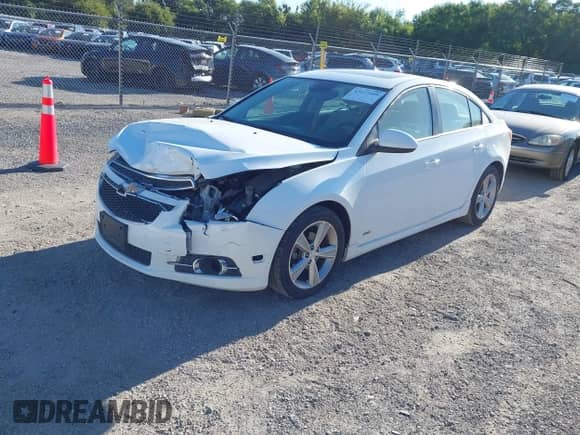 2013 Chevrolet Cruze 2LT z VIN 1G1PE5SBXD7295383, wystawiony jako IAAI lot #43127109 z przebiegiem 106 273 mil mil oraz . Historia ofert i sprzedaży dostępna na DreamBid. Obrazek 17.