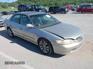 1998 Honda Accord EX with VIN 1HGCG1651WA029013, listed as a IAAI auction lot 42299474 with 277,250 mi miles and . Bid and sale history available at DreamBid. Image 1.