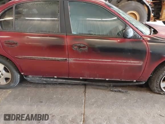 2004 Chevrolet Malibu Classic z VIN 1G1ND52F84M549946, wystawiony jako IAAI lot #42404927 z przebiegiem Nie podano mil oraz . Historia ofert i sprzedaży dostępna na DreamBid. Obrazek 15.