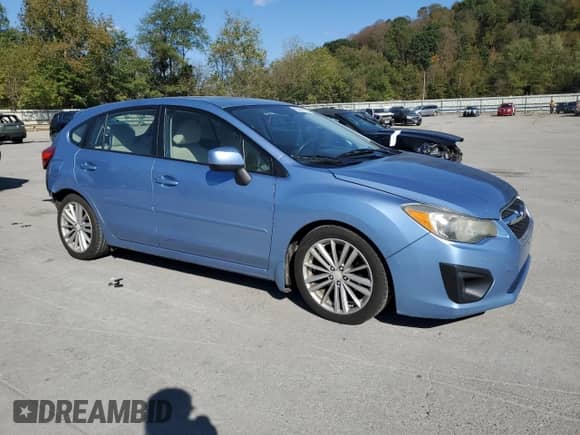 2012 Subaru Impreza Premium with VIN JF1GPAD6XCH219686, listed as a Copart auction lot 85149115 with 111,105 mi miles and Salvage title. Bid and sale history available at DreamBid. Image 4.