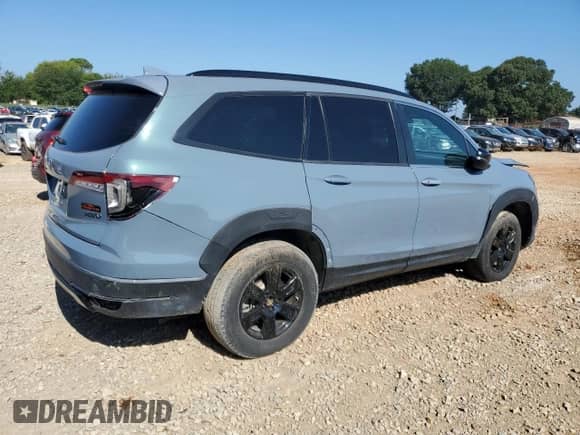 2022 Honda Pilot TrailSport с VIN 5FNYF6H88NB081272, выставлен на аукционе Copart как лот 69401935 с пробегом 15 787 миль миль и Чистый • Clean title. История ставок и продаж доступна на DreamBid. Изображение 3.