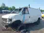 2006 Ford Econoline Cargo with VIN 1FTNE24W06HA21135, listed as a IAAI auction lot 42395308 with 302,529 mi miles and . Bid and sale history available at DreamBid. Image 2.