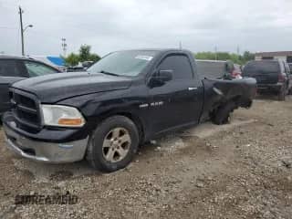 2009 Dodge 1500 SLT with VIN 1D3HB16T79J529562, listed as a Copart auction lot 77783804 with 235,289 mi miles and Salvage title. Bid and sale history available at DreamBid. Image 1.