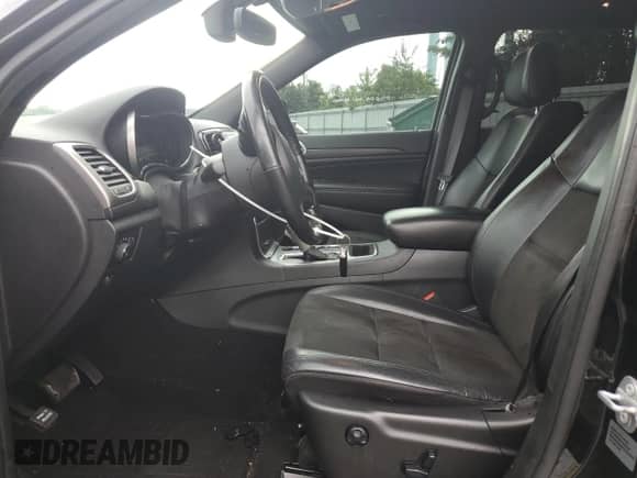 2020 Jeep Grand Cherokee Altitude with VIN 1C4RJFAG5LC159571, listed as a Copart auction lot 64872825 with 75,092 mi miles and Salvage title. Bid and sale history available at DreamBid. Image 7.