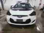 2012 Hyundai Veloster w/Gray Int z VIN KMHTC6AD2CU028769, wystawiony jako Copart lot #70858065 z przebiegiem 165 208 mil mil oraz Szkoda całkowita • Salvage title. Historia ofert i sprzedaży dostępna na DreamBid. Obrazek 5.