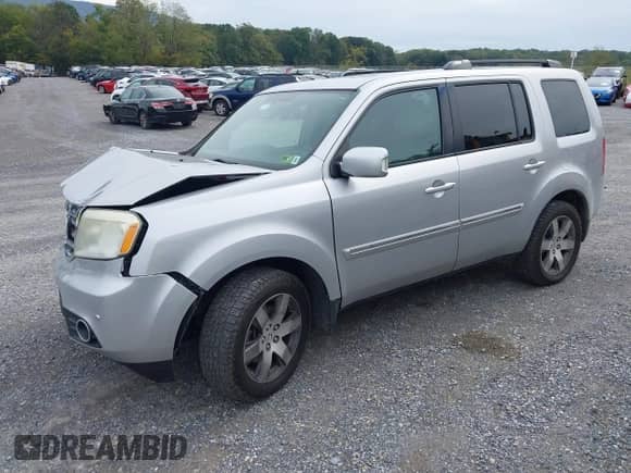 2014 Honda Pilot Touring with VIN 5FNYF4H97EB051760, listed as a IAAI auction lot 43329833 with 220,273 mi miles and . Bid and sale history available at DreamBid. Image 18.