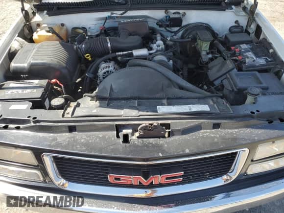 1996 GMC Sierra 1500 с VIN 1GTEC14W2TZ514059, выставлен на аукционе Copart как лот 57124765 с пробегом 179 718 миль миль и Списание • Salvage title. История ставок и продаж доступна на DreamBid. Изображение 11.
