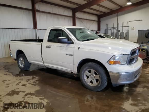 2009 Dodge 1500 SLT с VIN 1D3HB16P79J516569, выставлен на аукционе Copart как лот 53142355 с пробегом 156 439 миль миль и Списание • Salvage title. История ставок и продаж доступна на DreamBid. Изображение 4.
