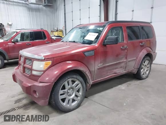 2007 Dodge Nitro R/T with VIN 1D8GU58617W623256, listed as a IAAI auction lot 38476182 with 99,056 mi miles and . Bid and sale history available at DreamBid. Image 2.