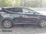 2014 Hyundai Santa Fe z VIN 5XYZUDLB1EG142908, wystawiony jako IAAI lot #43335665 z przebiegiem 175 825 mil mil oraz . Historia ofert i sprzedaży dostępna na DreamBid. Obrazek 13.
