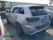 2015 Jeep Grand Cherokee SRT z VIN 1C4RJFDJ0FC237833, wystawiony jako IAAI lot #41342190 z przebiegiem 129 518 mil mil oraz . Historia ofert i sprzedaży dostępna na DreamBid. Obrazek 3.