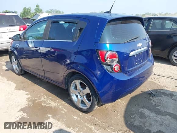 2014 Chevrolet Sonic LTZ with VIN 1G1JE6SB4E4226395, listed as a IAAI auction lot 42399611 with 150,847 mi miles and . Bid and sale history available at DreamBid. Image 3.