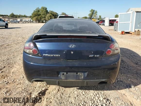 2008 Hyundai Tiburon GT с VIN KMHHN66F68U279070, выставлен на аукционе Copart как лот 74675574 с пробегом 92 020 миль миль и Списание • Salvage title. История ставок и продаж доступна на DreamBid. Изображение 6.