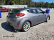 2013 Hyundai Veloster w/Black Int z VIN KMHTC6AD2DU144524, wystawiony jako Copart lot #86604965 z przebiegiem 101 979 mil mil oraz Czysty tytuł • Clean title. Historia ofert i sprzedaży dostępna na DreamBid. Obrazek 3.