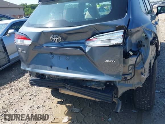 2022 Toyota Corolla Cross L with VIN 7MUAAABGXNV035110, listed as a IAAI auction lot 42562359 with 17,106 mi miles and . Bid and sale history available at DreamBid. Image 18.