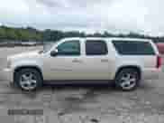 2009 Chevrolet Suburban LTZ with VIN 1GNFC36J39R242199, listed as a IAAI auction lot 43322206 with 306,353 mi miles and . Bid and sale history available at DreamBid. Image 14.