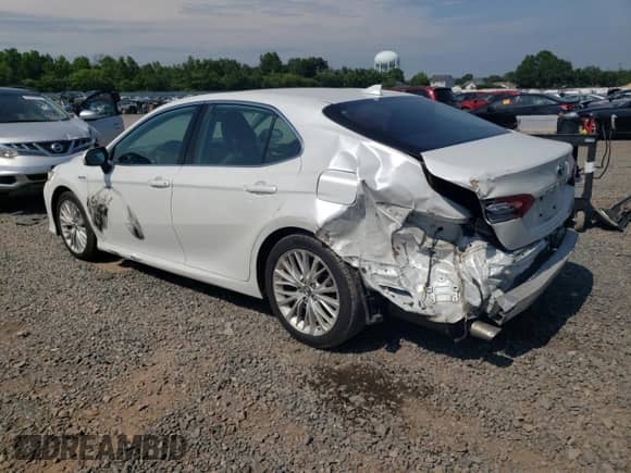 2019 Toyota Camry Hybrid LE с VIN 4T1B21HK5KU014272, выставлен на аукционе Copart как лот 62397815 с пробегом 59 834 миль миль и Списание • Salvage title. История ставок и продаж доступна на DreamBid. Изображение 2.