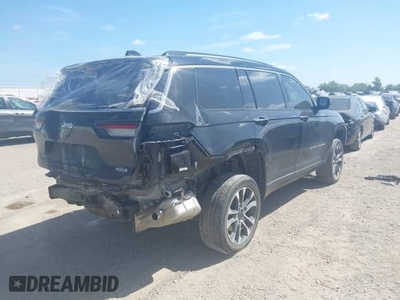 2023 Jeep Grand Cherokee Overland z VIN 1C4RJKDG5P8771928, wystawiony jako IAAI lot #42602996 z przebiegiem 32 691 mil mil oraz . Historia ofert i sprzedaży dostępna na DreamBid. Obrazek 4.