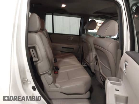 2014 Honda Pilot EX-L with VIN 5FNYF4H5XEB012061, listed as a IAAI auction lot 42216069 with 76,113 mi miles and . Bid and sale history available at DreamBid. Image 8.